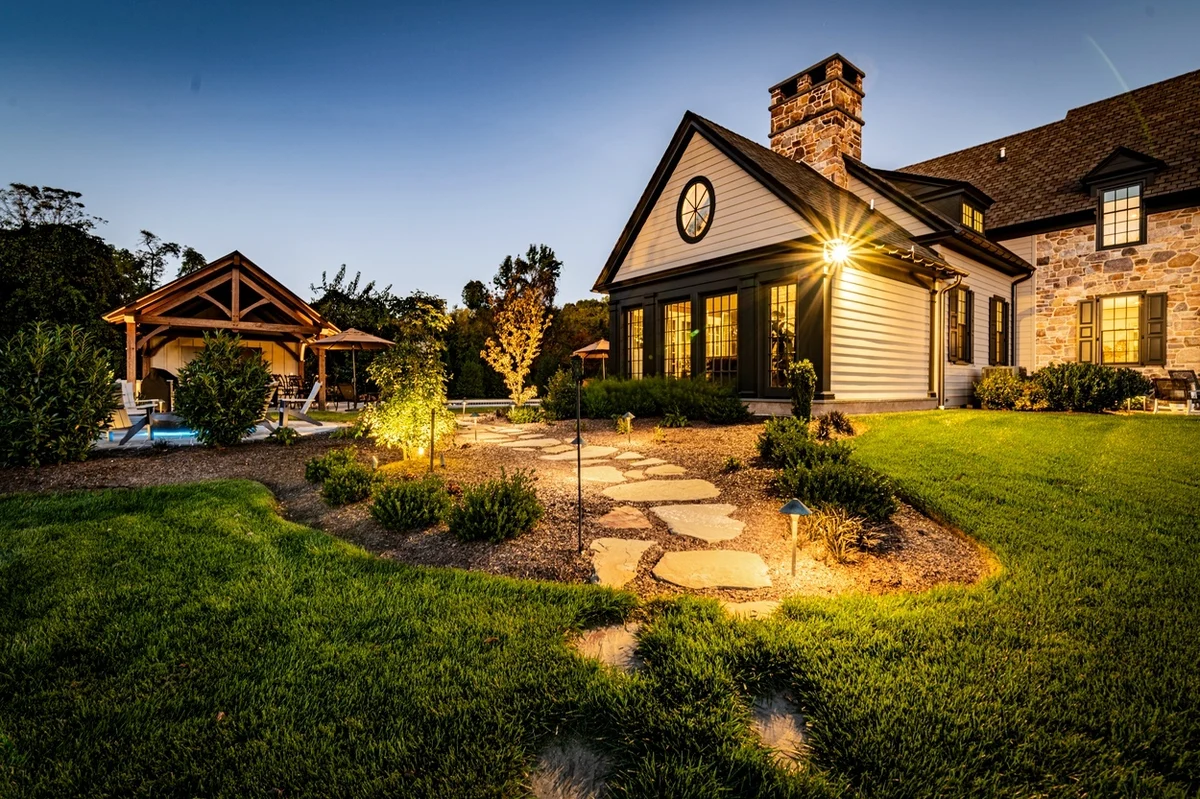 Landscape lighting along a stone garden path